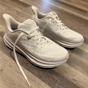 Women’s Hoka Clifton 9 sneakers. Size 9.5 in excellent condition. White.